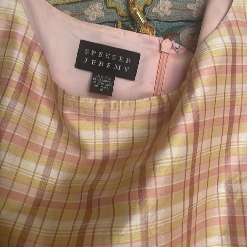 Lovely plaid silk in pink and peach  zipper. Worn once 18 “from AH to AH